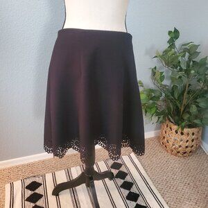 Loft A Line skirt in black with cutout detail along hemline size 10